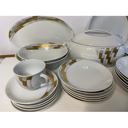 697 - 33 piece Tun Czech white and gold dinner set.