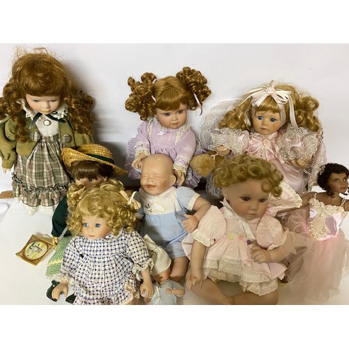 630 - Collection of porcelain dolls including Alberon, Kathy Hippensteel, Titus Tomescu and others.