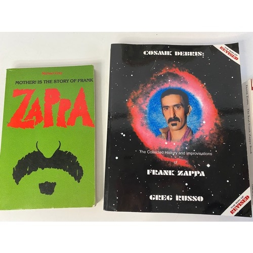 739 - 3 x Frank Zappa books and tin sign.