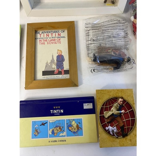 814 - Selection of TinTin memorabilia including pictures, postcards, figures etc