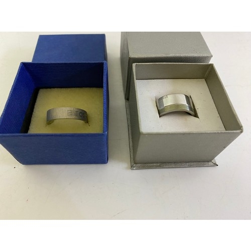 937 - 2 Gents steel and titanium rings from Storm, size N & M