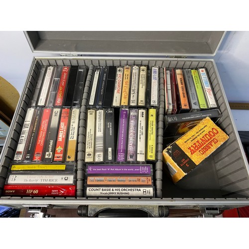 108 - Collection of cassette tapes and storage boxes.