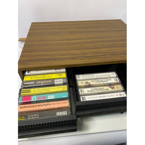 108 - Collection of cassette tapes and storage boxes.