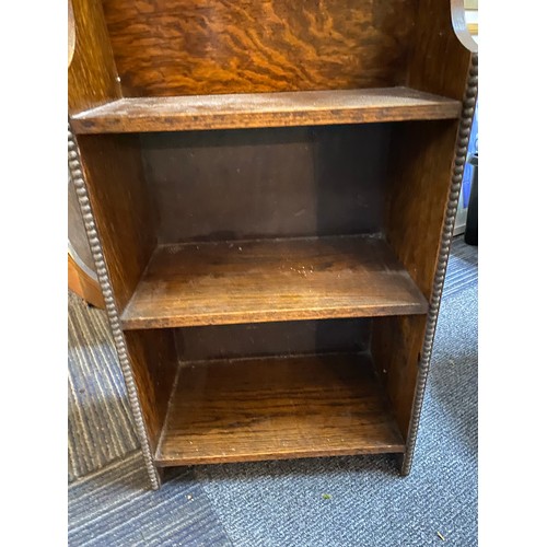 109 - Small Edwardian oak open bookcase/newspaper rack measuring 79cm tall