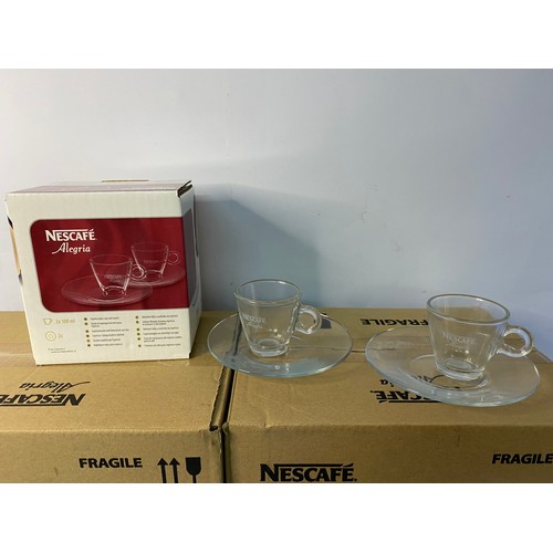 114 - 2 x boxes of brand new Nescafe glass cups and saucers.