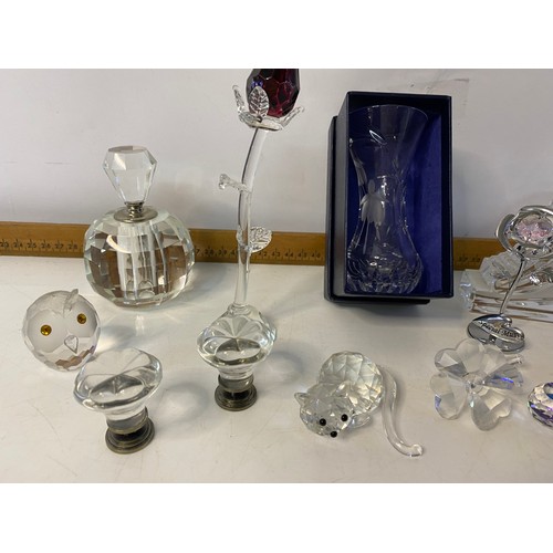 154 - Collection of crystal items including a Waterford crystal clock, Stuart crystal vase and various orn... 