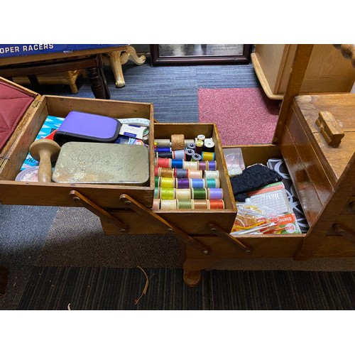 155 - Vintage oak cantilever sewing box on cabriole legs to include contents measuring 59cms x 57cms