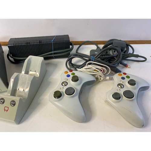 171 - Xbox 360 console with 2 x controllers, charging dock and leads. Tested and working