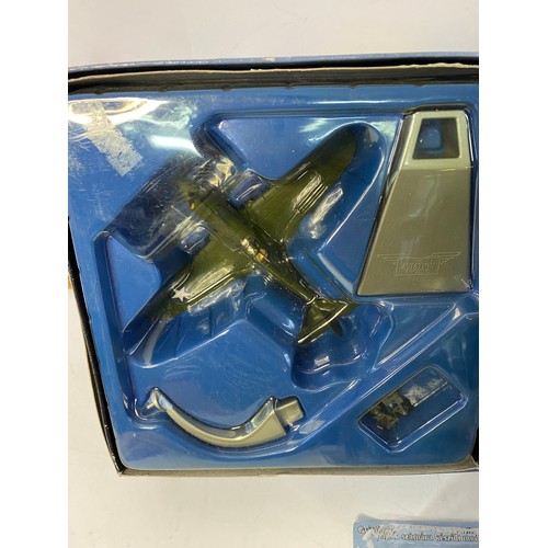 12 - 3 die cast model aircraft.