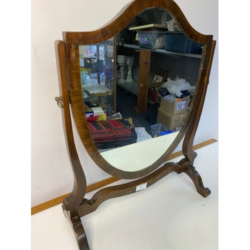 32 - Dressing table vanity shield shaped mirror measuring 56 x 45 cms