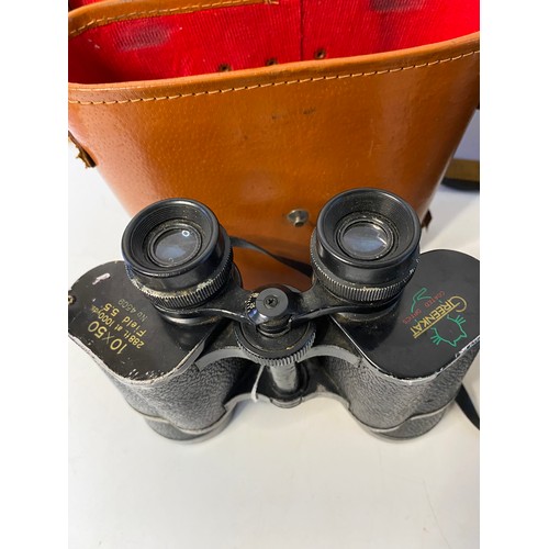 86 - 2 x pairs of vintage binoculars.