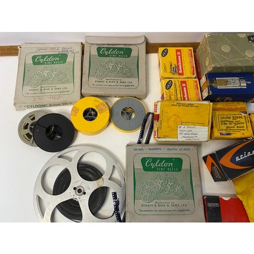 26 - Box of vintage cine reels.