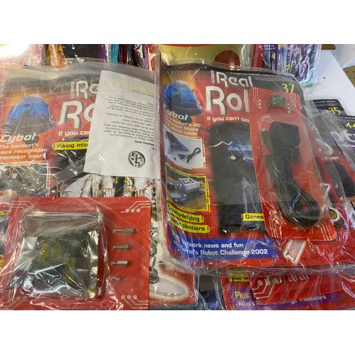 370 - Boxed lot of Real Robots magazines and parts