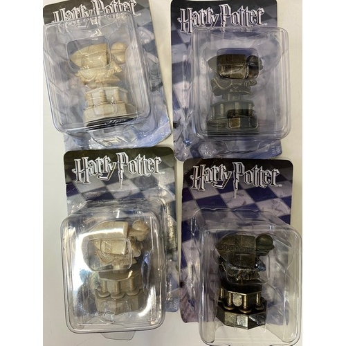 145 - Selection of Harry Potter items including chess pieces, games and audiobooks.