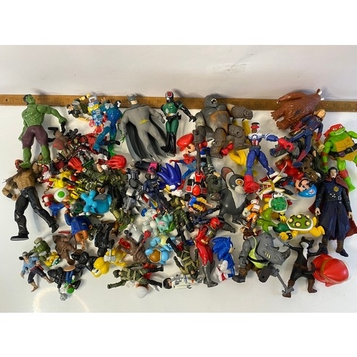 168 - Box of assorted play figures including Sonic, Mario, Turtles and others, 1980's - 2000's.