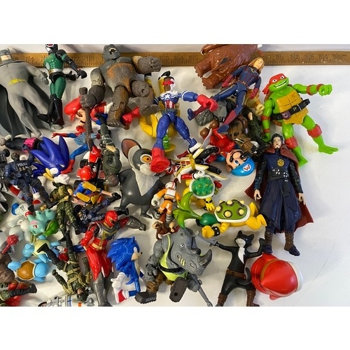 168 - Box of assorted play figures including Sonic, Mario, Turtles and others, 1980's - 2000's.