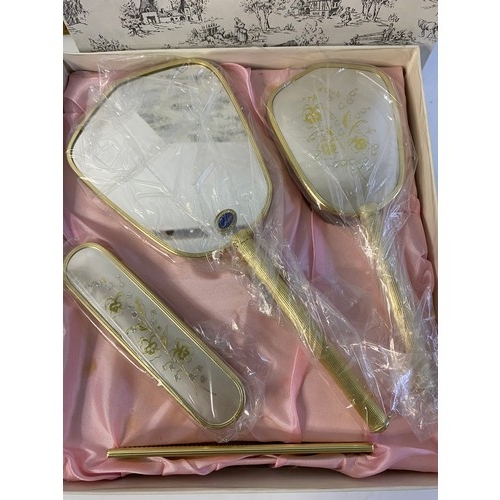 176 - Assortment of vintage vanity sets, hand mirrors and brushes