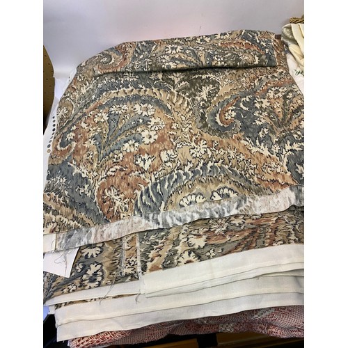 498 - Selection of curtain fabric and vintage curtains and curtain tie backs.