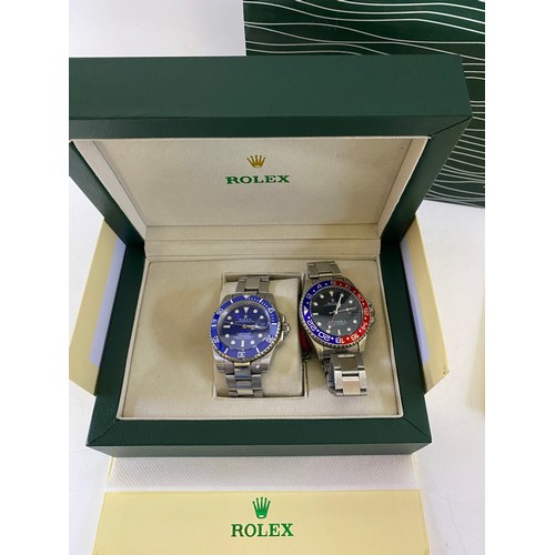 490 - A copy Rolex Submariner watch in box with papers and a copy RGMT- Master II without box.