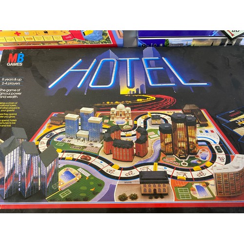 501 - Selection of 3 x board games, MB Games 'Game of Life' and 'Hotel' and Hasbro 'Monopoloy The Mega Edi... 