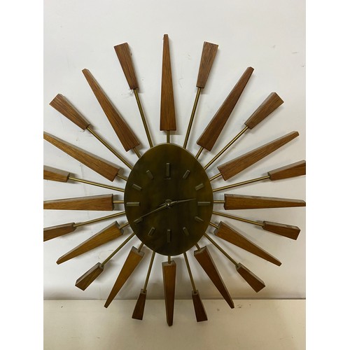 330 - Mid century sunburst clock in brass and teak made by Manley, 50cms diameter