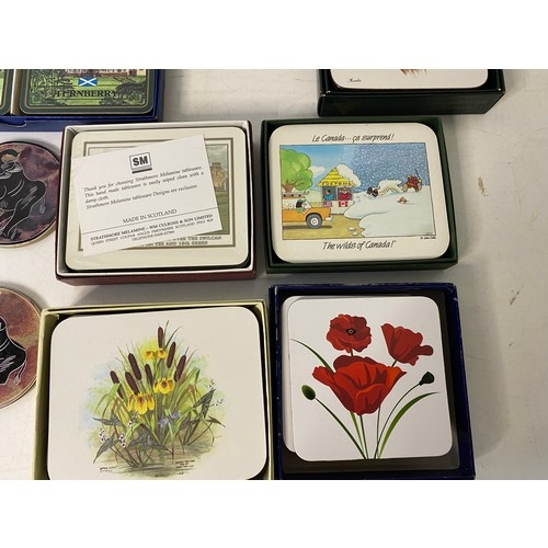 522 - Collection of vintage placemats and coasters.