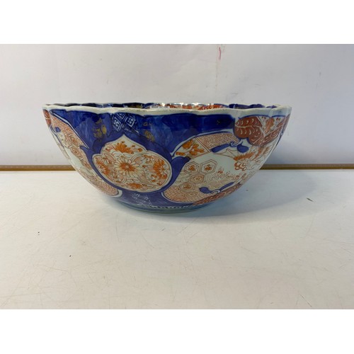 110 - Large Japanese Imari bowl with scalloped rim, 31cm diameter x 12.5cm deep.