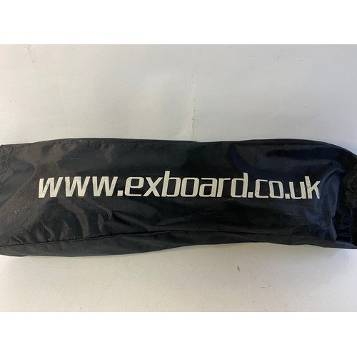 158 - Exboard Skateboard in carry bag with protective gear and manual.