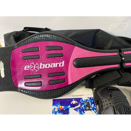 158 - Exboard Skateboard in carry bag with protective gear and manual.