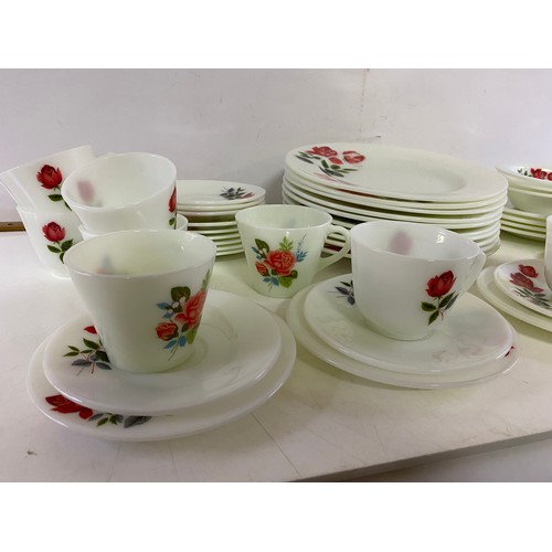 159 - 45 piece JAJ Pyrex June Rose dinnerware.