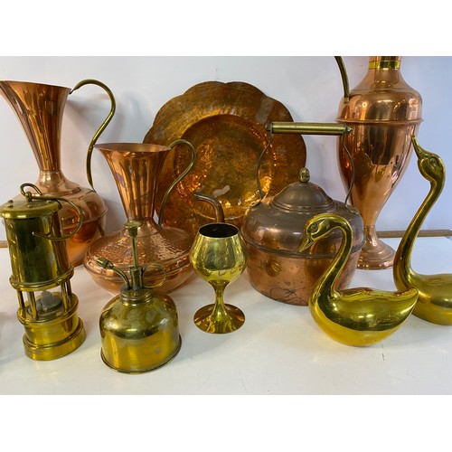 169 - Box of brass and copperware including jugs and ornaments.