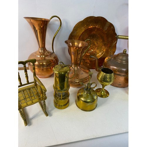 169 - Box of brass and copperware including jugs and ornaments.