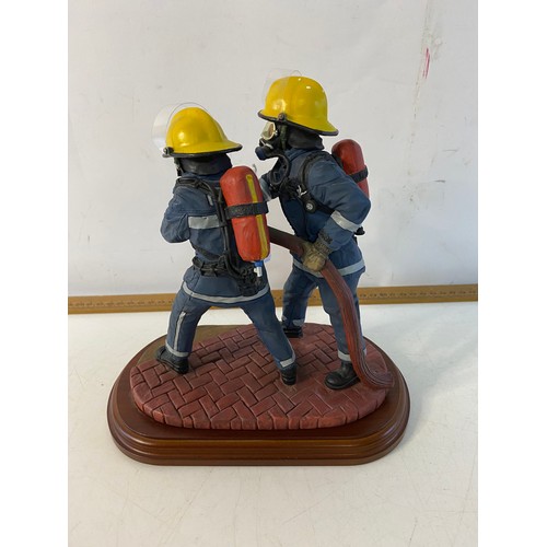 171 - Ballantynes of Walkerburn figure of firefighters 21cms tall.