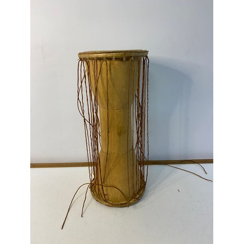 191 - Argentinian Bombo Leguro drum 47x38cm and an African talking drum 43cm tall