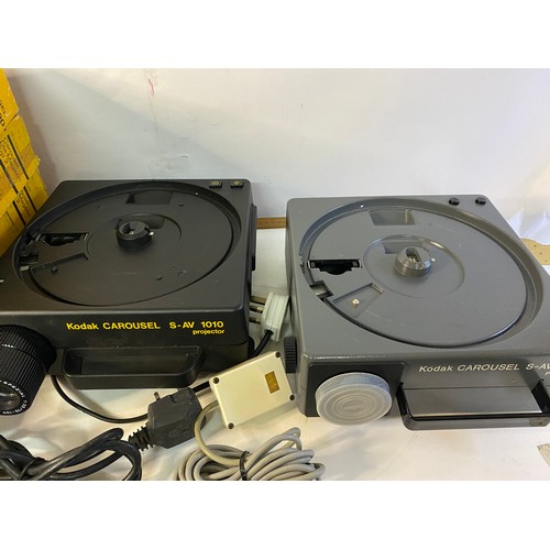 199 - Kodak S-AV 2020 carousel slide projector in working order with empty slide trays. Also a S-AV1010 pr... 