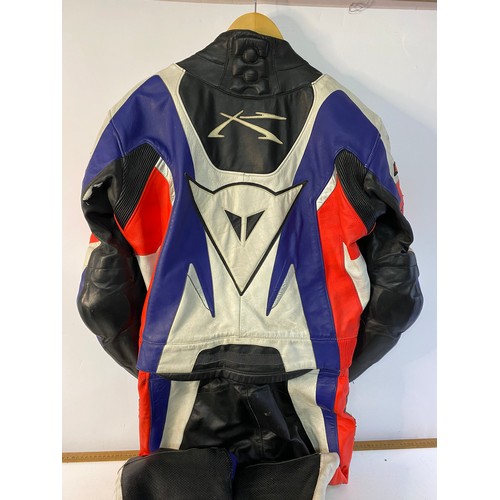 200 - Dainese 2 piece leather motorcycle race suit size 52 in used condition.