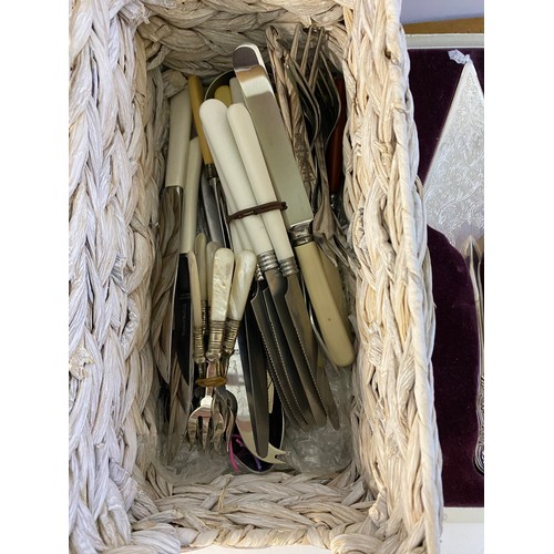 204 - Dubarry design mahogany cased cutlery set plus basket of other assorted cutlery.