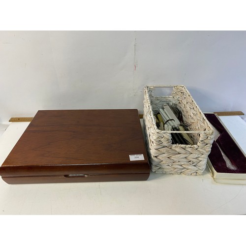 204 - Dubarry design mahogany cased cutlery set plus basket of other assorted cutlery.