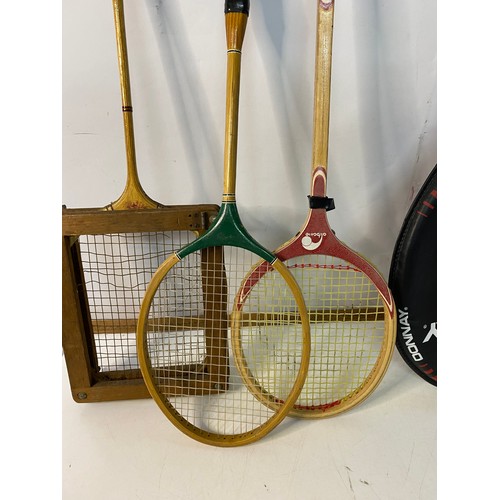 206 - An assortment of vintage rackets.