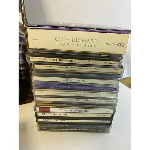 218 - Selection of Cliff Richards records, CDs and books.