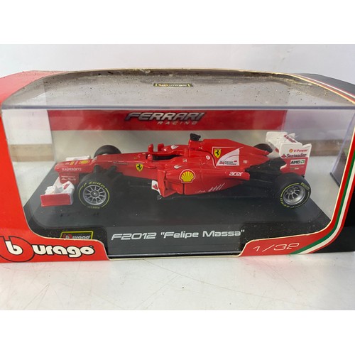 439 - Selection of F1 models including Burago 1:32 Ferrari, a Minichamps Ayrton Senna 1993 Mclaren, a 1998... 