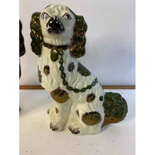 468 - Large pair of ceramic mantle dogs standing 33 cms tall