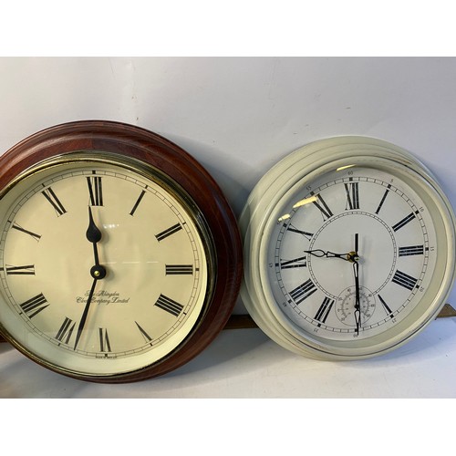 228 - A selection of quartz table and wall clocks.