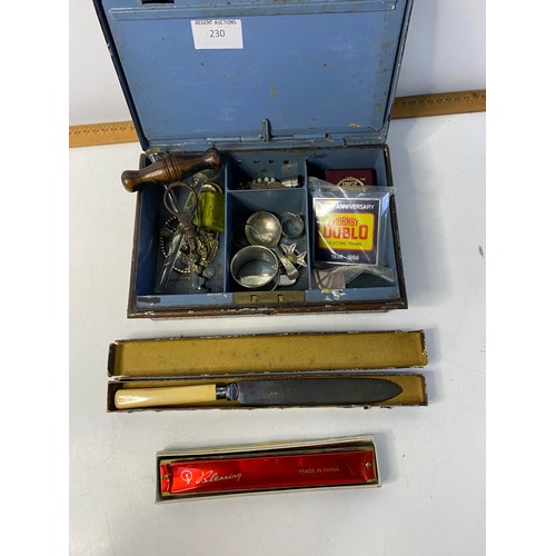 230 - Victorian cash tin containing a selection of silverware and curios including Georgian silver caddy s... 