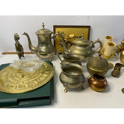 254 - Box of mixed brass and metalware including sundial, wall lights and ornaments.