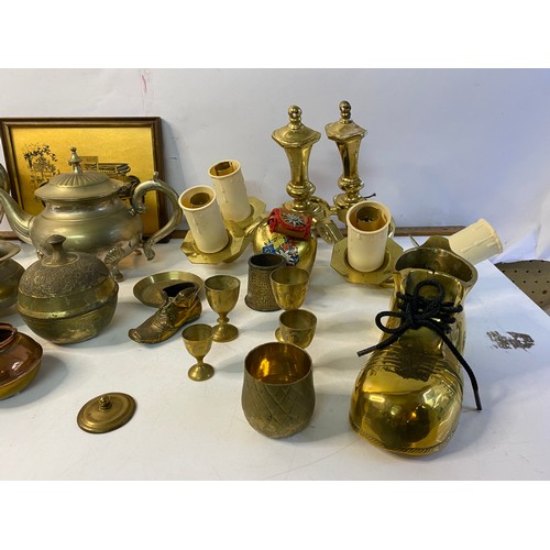 254 - Box of mixed brass and metalware including sundial, wall lights and ornaments.