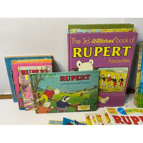 262 - Box of vintage Rupert books and comics from 1970's -90's. Many still have the free gifts attached.