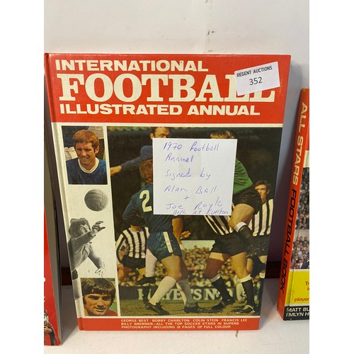 352 - Collection of football memorabilia. 3 x signed football books, signed by Alex Ferguson, Alan Ball, J... 