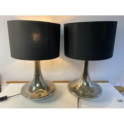 361 - Pair of table lamps standing 53 cms tall with black shade and mottle effect glass base