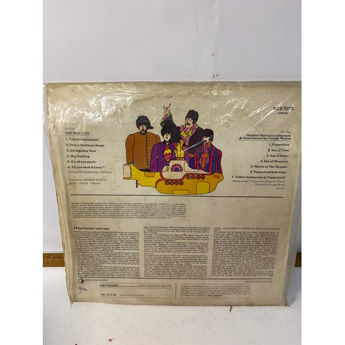 388 - The Beatles Yellow Submarine LP in original cover, dust cover and plastic cover.